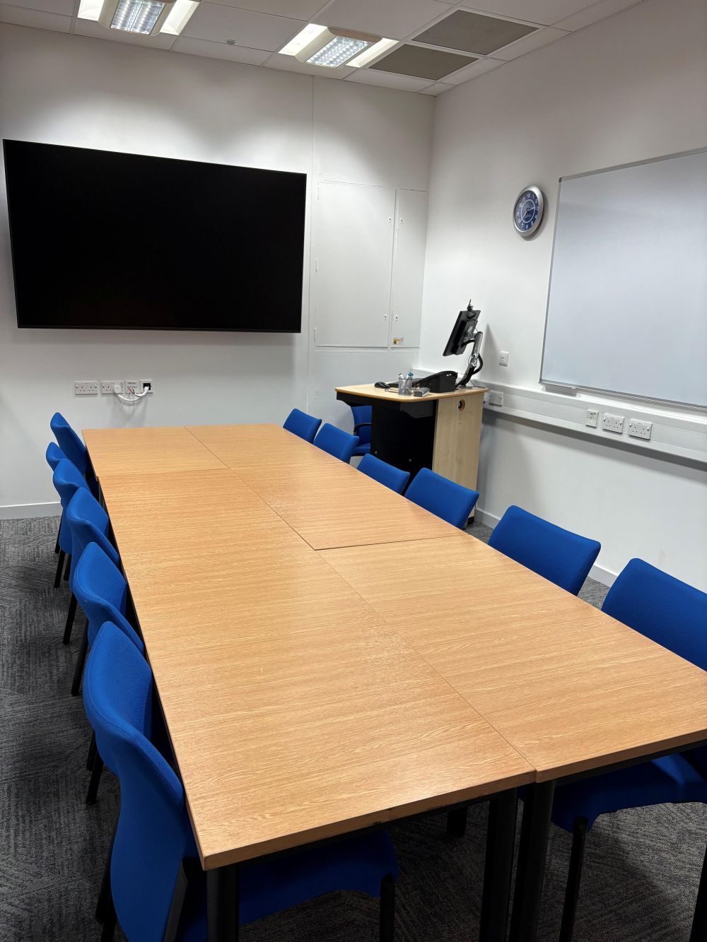 An image of a room with a large table.