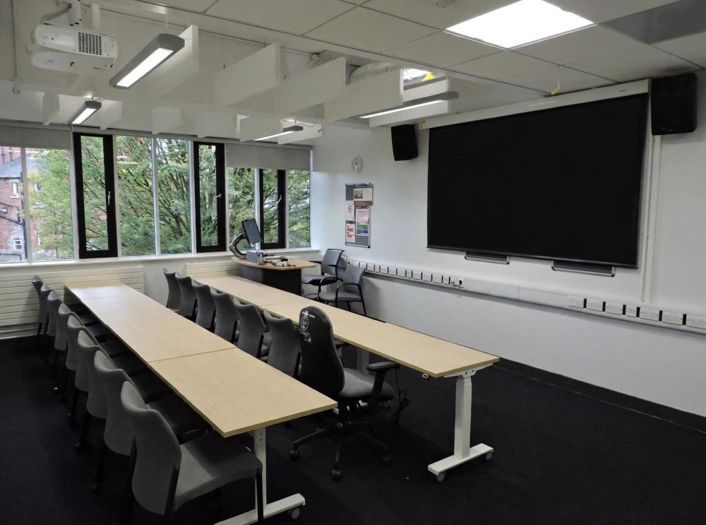 A room with tables and chairs