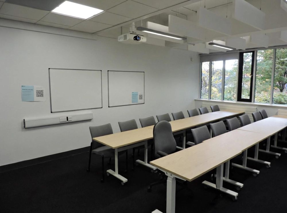 A room with tables and chairs