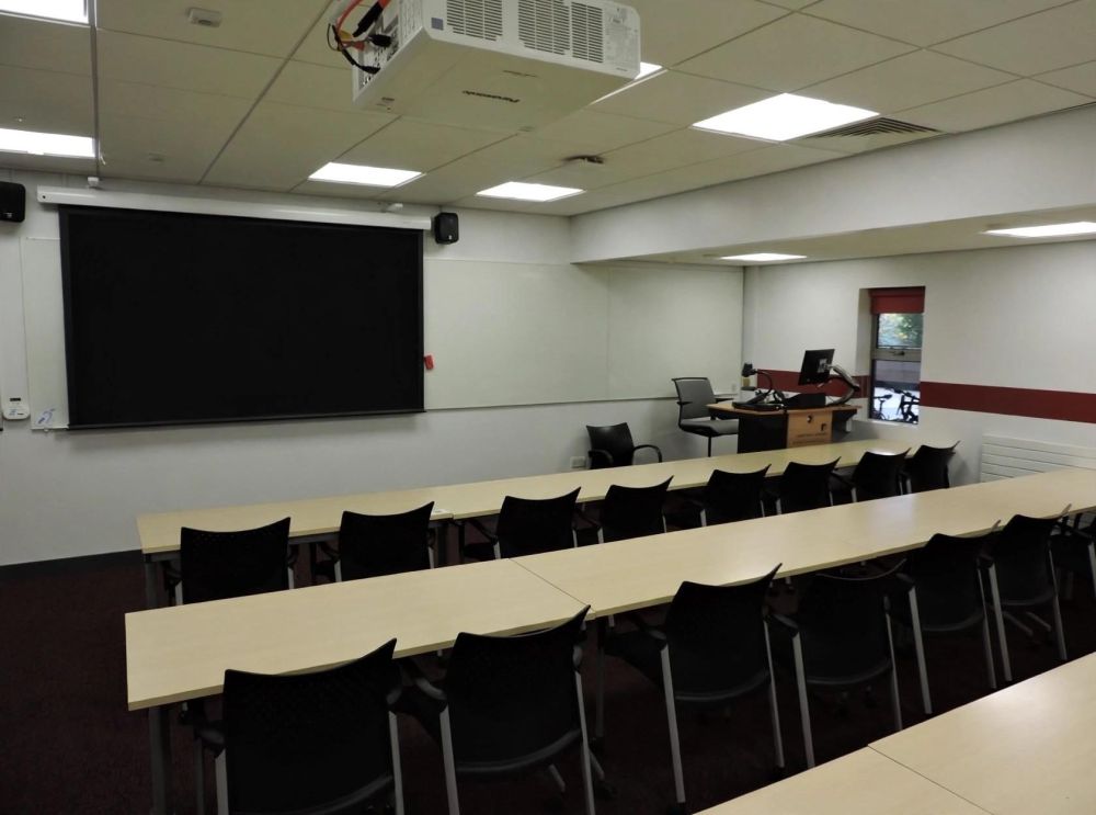 A room with tables and chairs