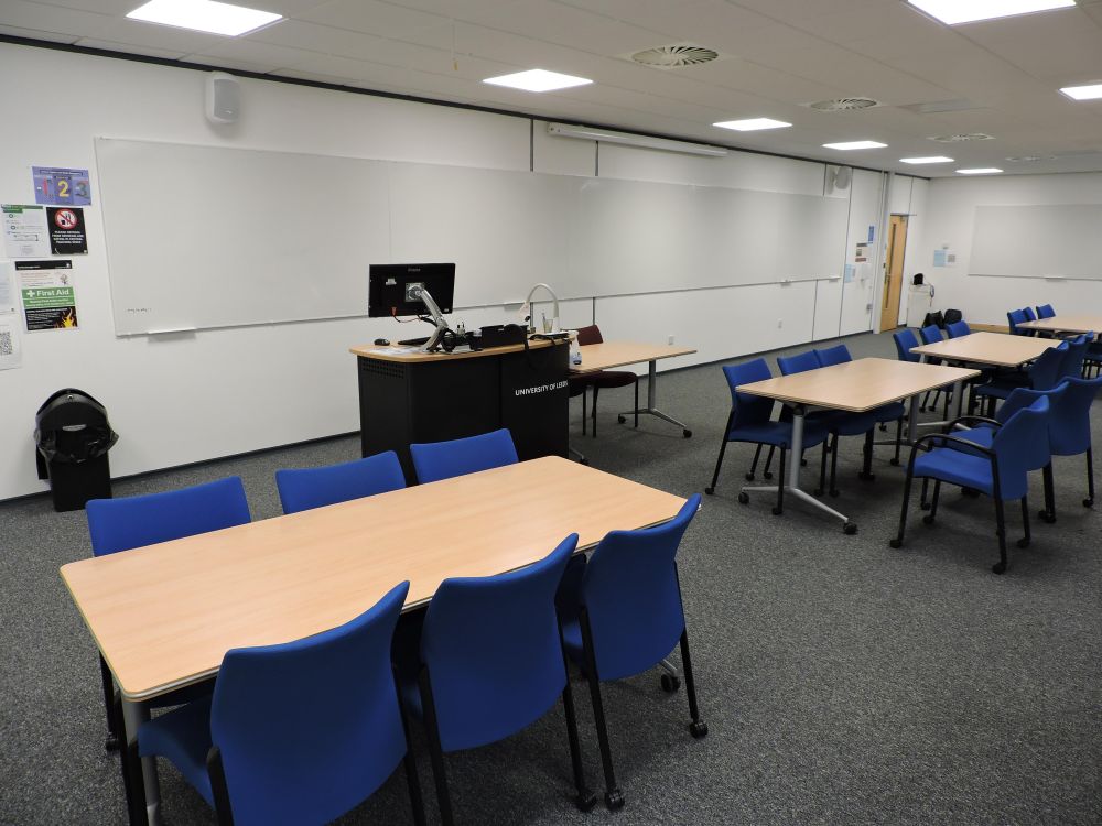 A room with tables and chairs