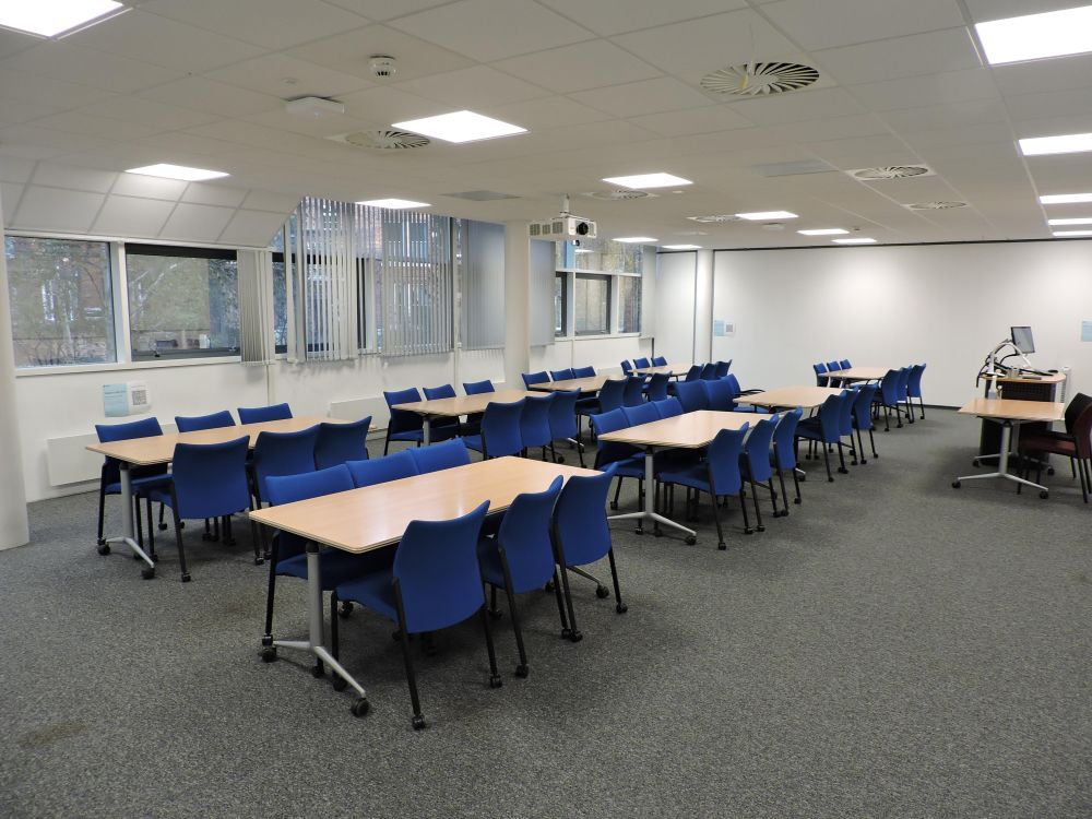 A room with tables and chairs