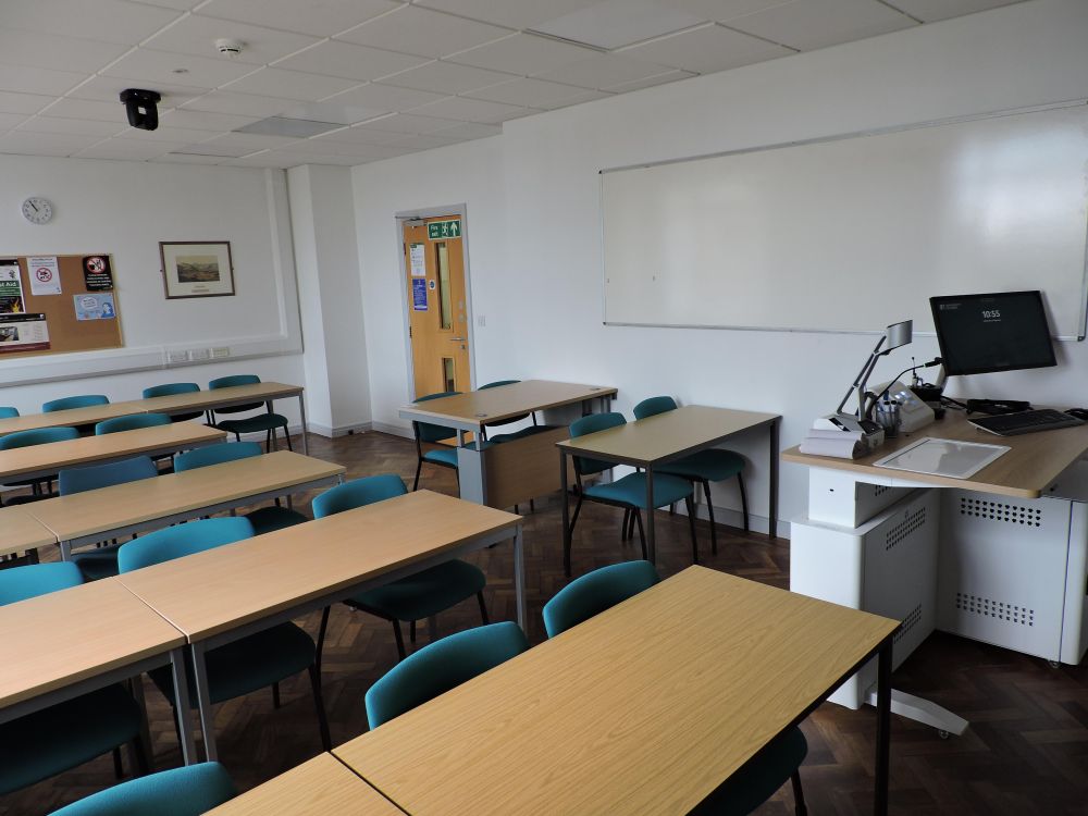 A room with tables and chairs