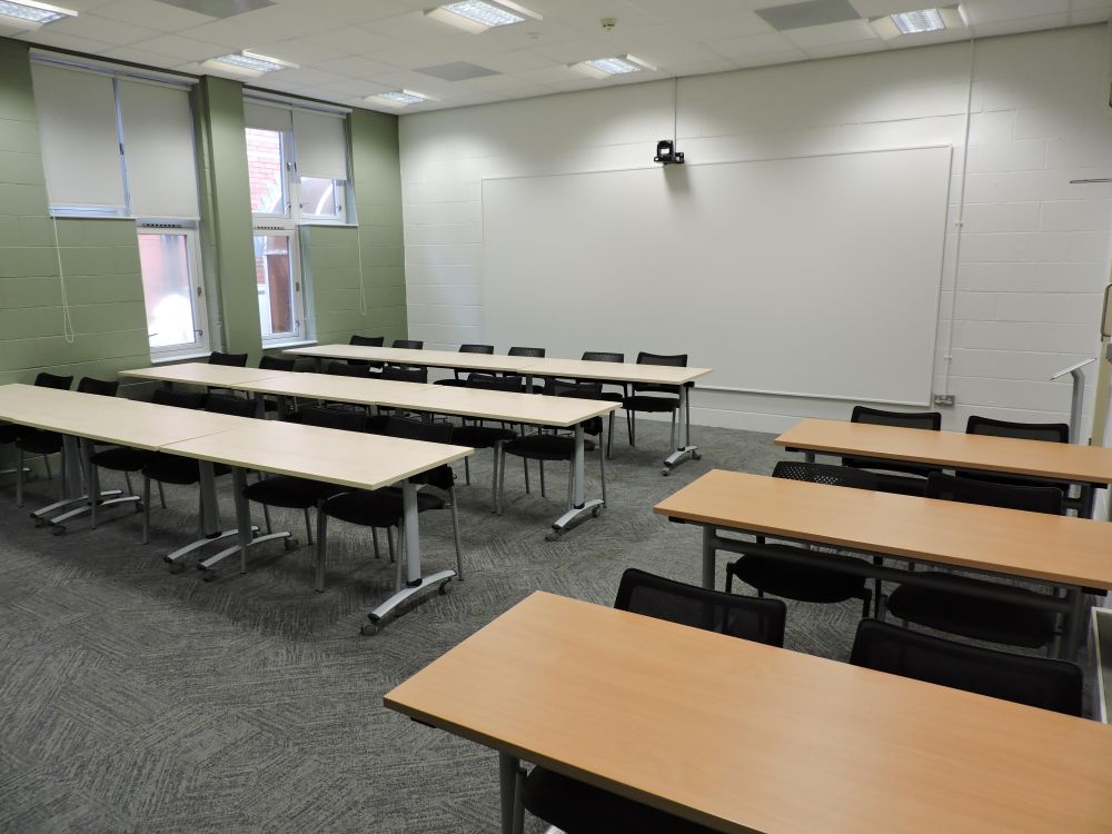 A room with tables and chairs