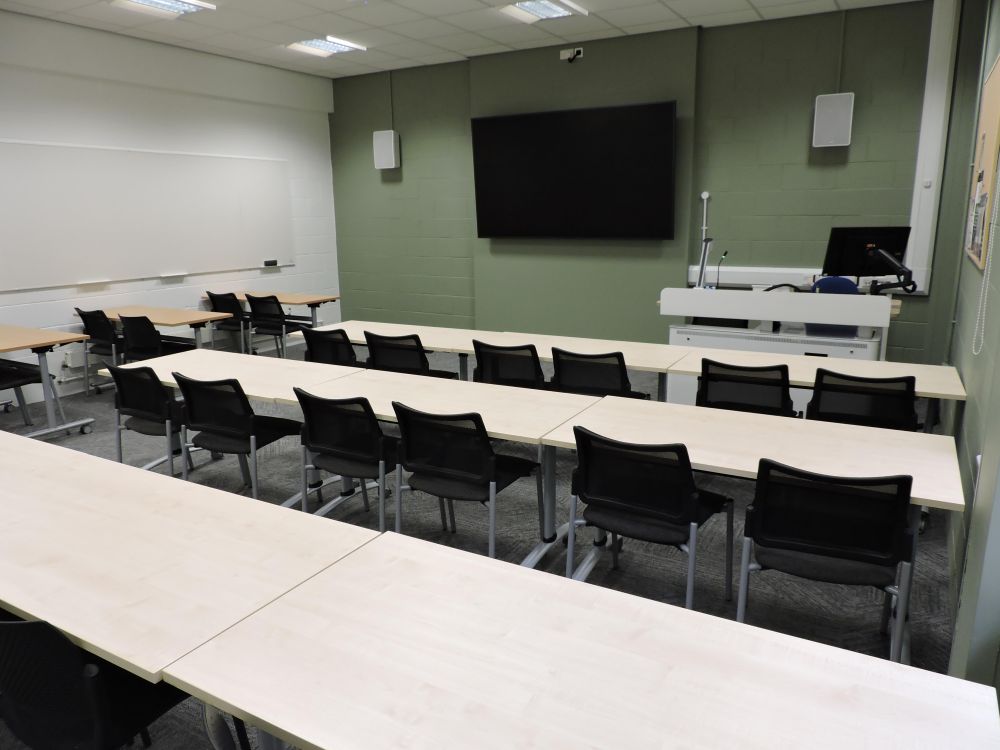 A room with tables and chairs