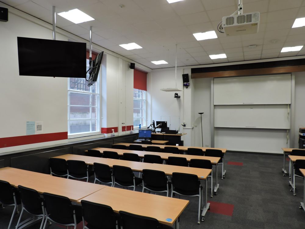 A multimode room with tables and chairs