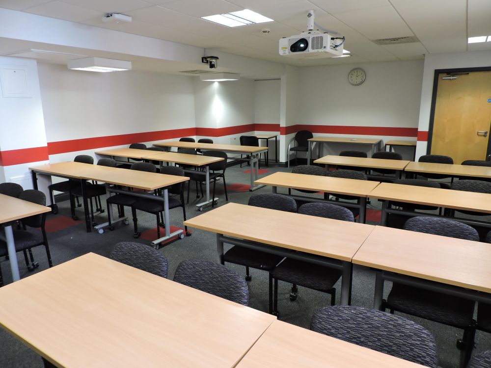 A room with tables and chairs