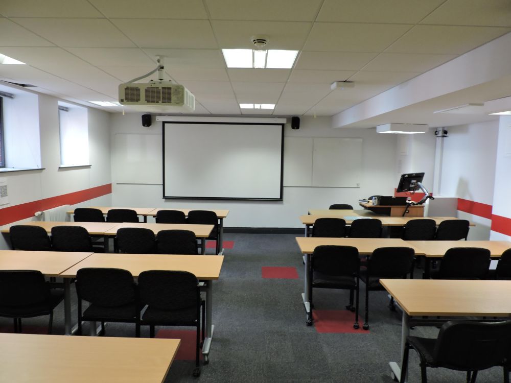 A room with tables and chairs