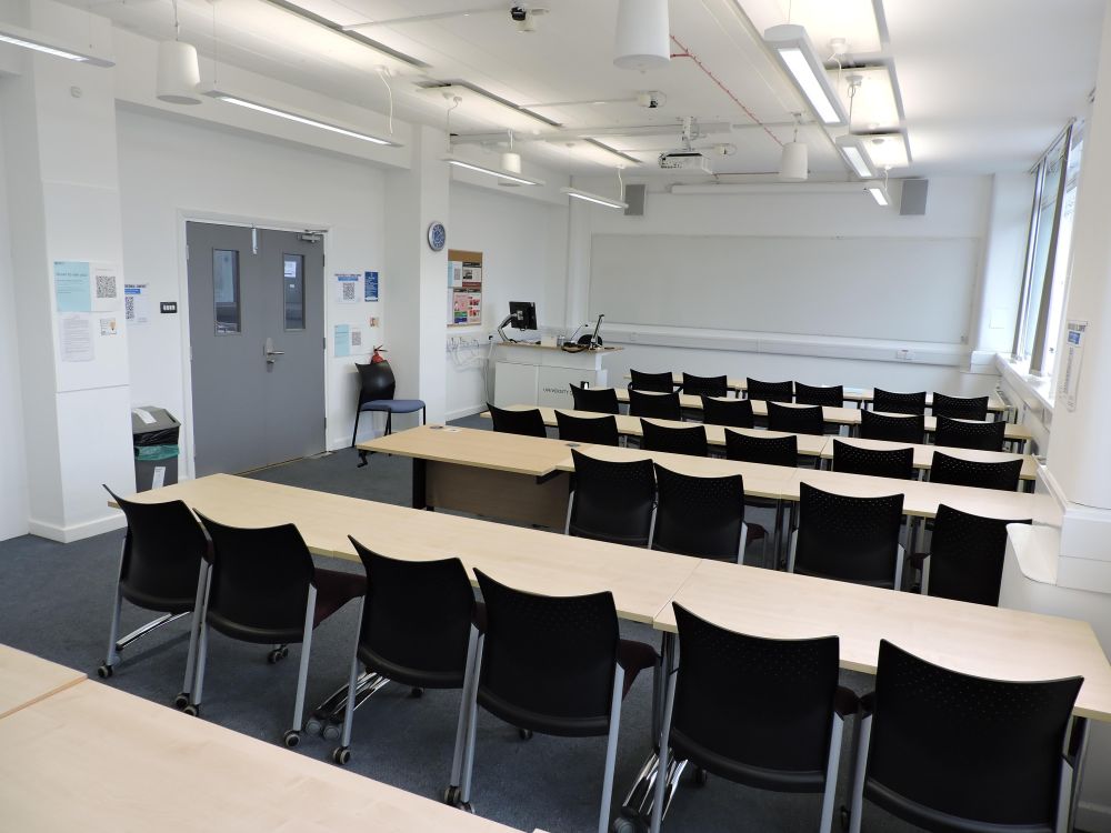A room with tables and chairs
