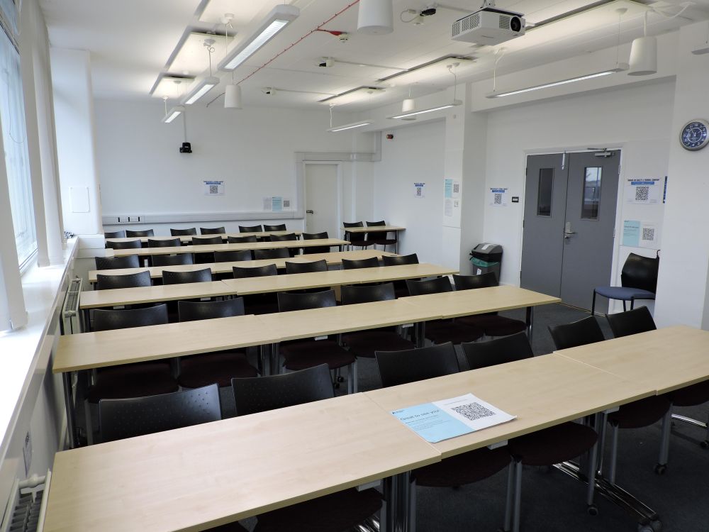 A room with tables and chairs