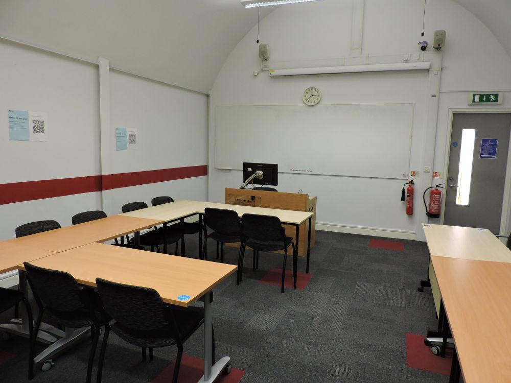 A room with tables and chairs