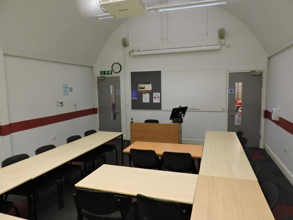 A room with tables and chairs