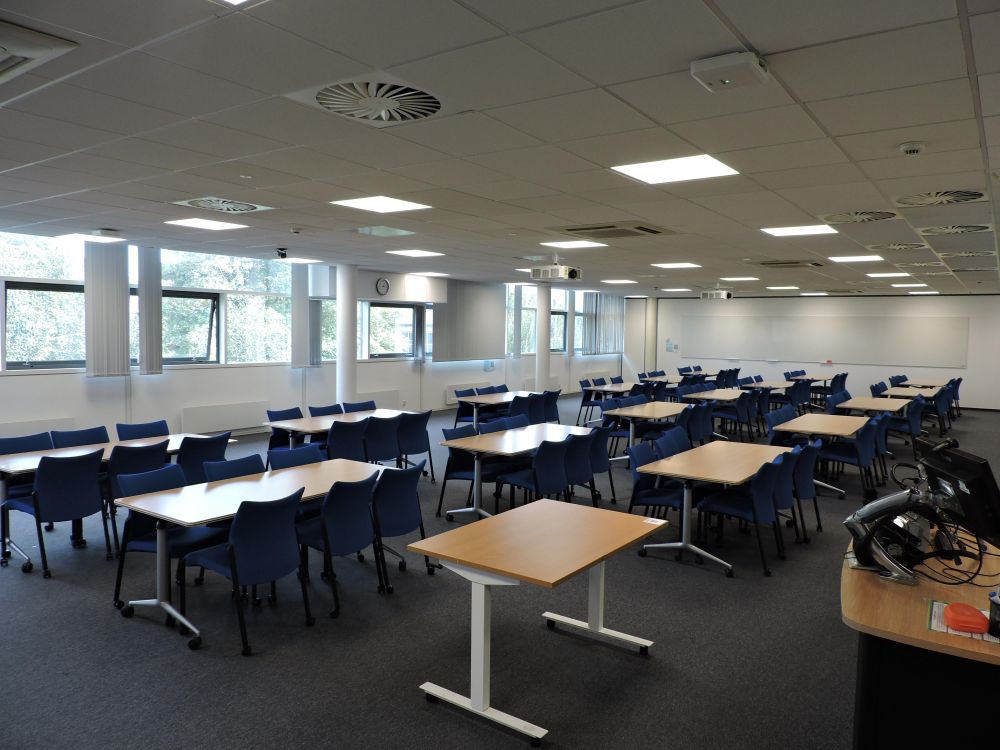 A room with tables and chairs
