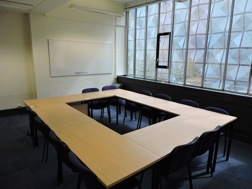 A room with tables and chairs