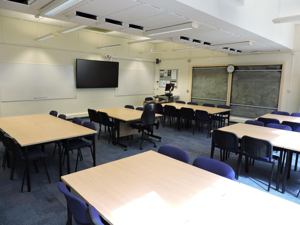A room with tables and chairs