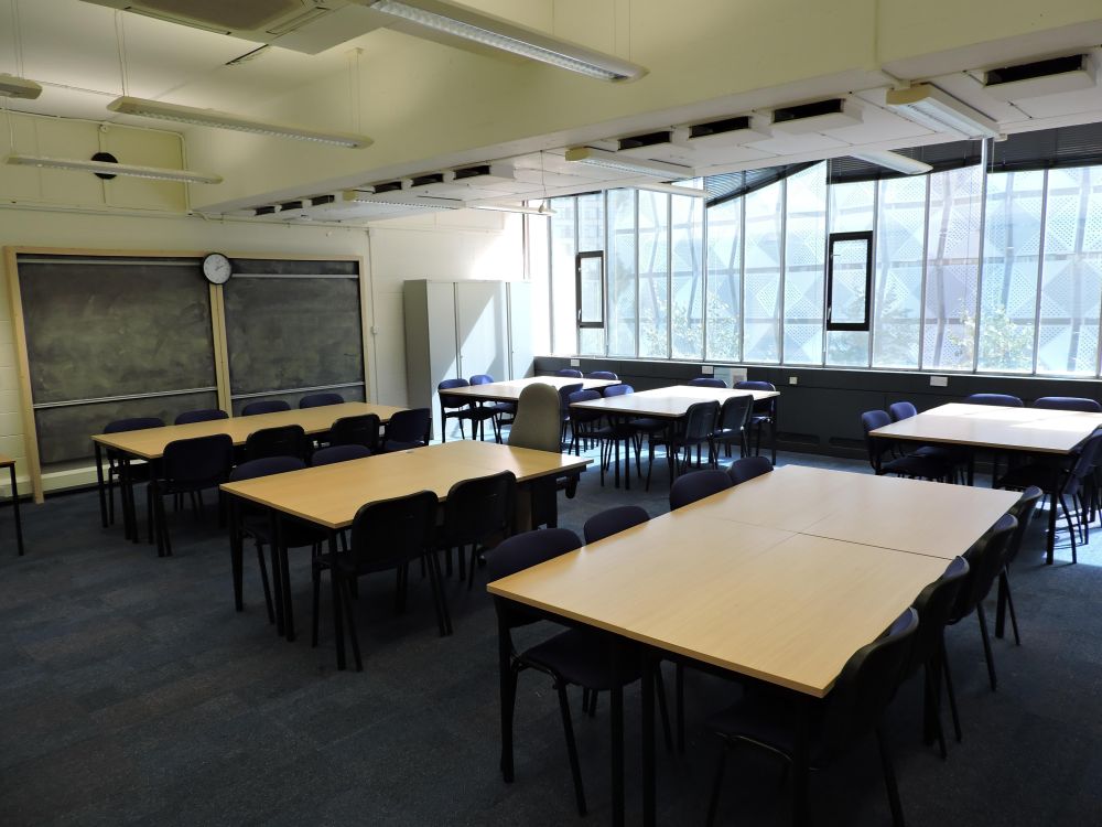 A room with tables and chairs