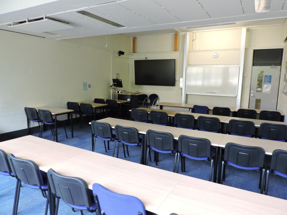 A room with tables and chairs