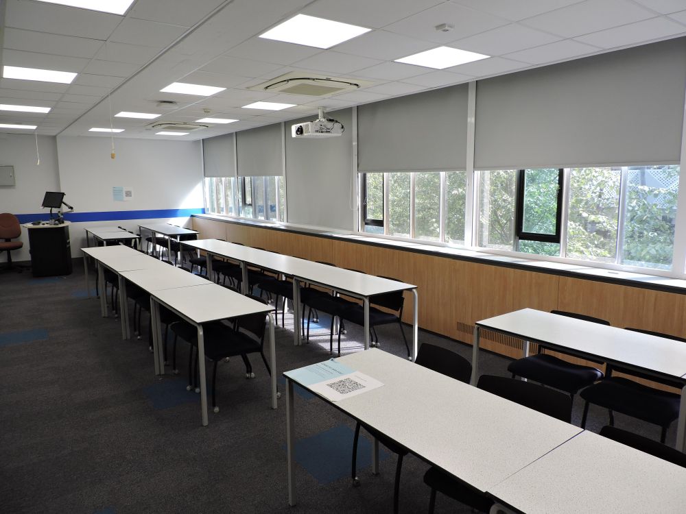 A room with tables and chairs
