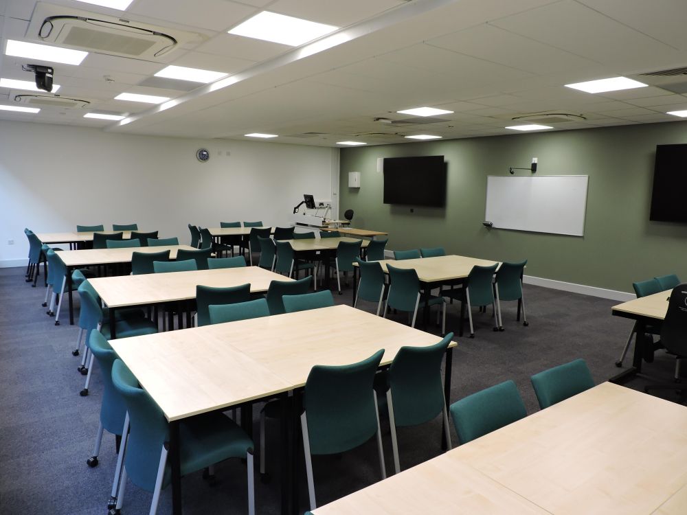 A room with tables and chairs