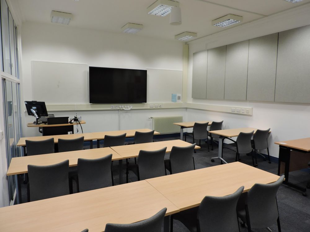A room with tables and chairs