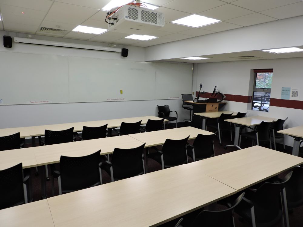 A room with tables and chairs