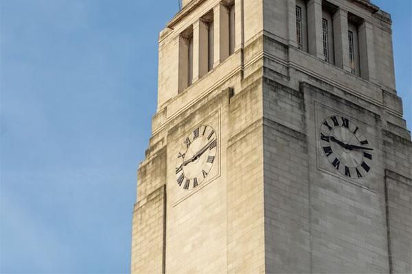 The Parkinson clock tower on a sunny day, with blue sky.