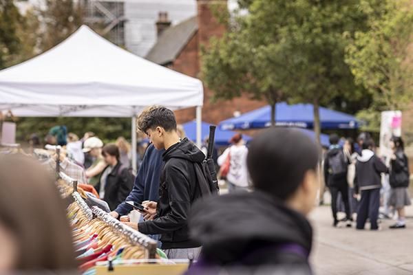 Students at a vintage clothing fair outside Leeds University Union during Welcome Week