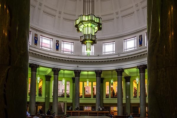 Interior of the Brotherton Library with a large light and pillars
