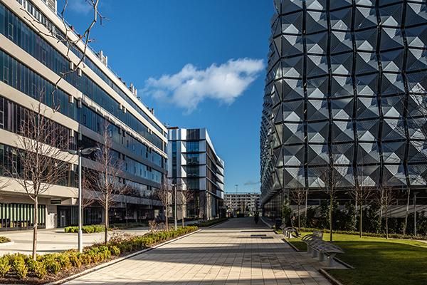 View of nexus and the multi storey carpark with a blue sky