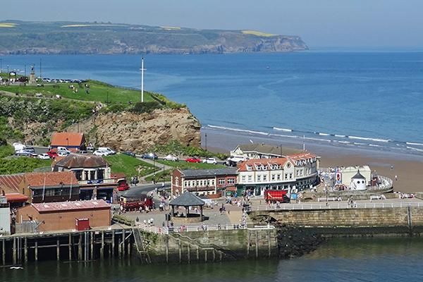 Whitby harbour surrounded by sea