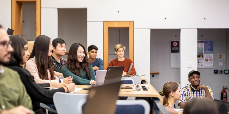 A group of students attending a lecture in the Roger Stevens building.