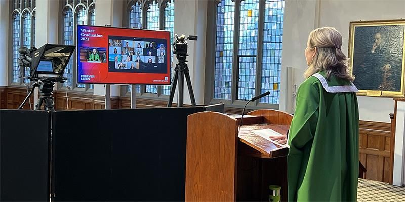 A presenter speaking to graduands on a Zoom call during their virtual graduation