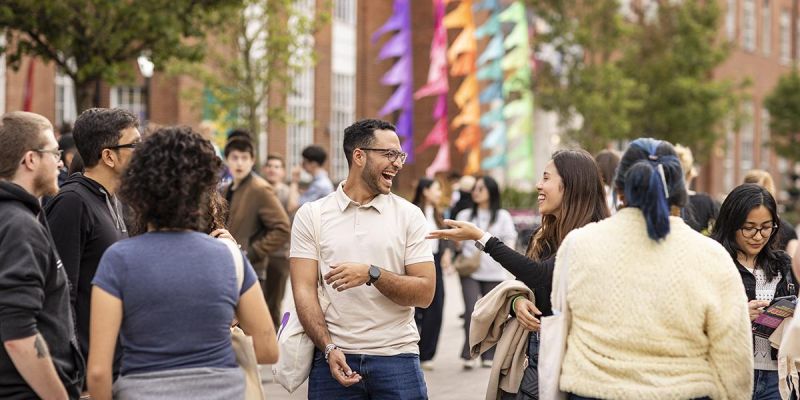 Students laughing outside LUU during Welcome Week